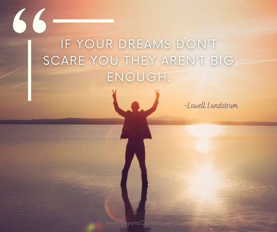 Image of man standing on water hands raised over head with quote " If your dreams don't scare you they are not big enough" Lowell Lundstrum