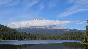 Tranquila lake with Mount Hood in the background. inviting you to Unlock and embody your authentic power